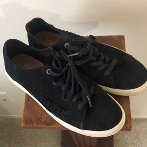 Toms tennis shoes.  Black. Cut outs on side. Suede like material.  GUC. Size 7.